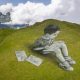 A land art painting representing a child drawing by Swiss-French artist SAYPE is pictured at the Chamossiare in Villars-sur-Ollon, Switzerland