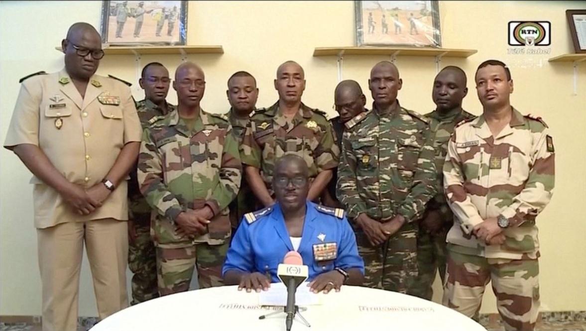 Niger Army spokesman Colonel Major Amadou Adramane speaks during an appearance on national television, after President Mohamed Bazoum was held in the presidential palace