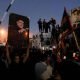 Protesters gather near the Swedish embassy in Baghdad hours after the embassy was stormed and set on fire ahead of an expected Koran burning in Stockholm, in Baghdad