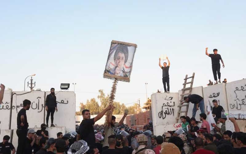 Protesters clash with security forces members as they gather near the Swedish embassy in Baghdad hours after the embassy was stormed and set on fire ahead of an expected Koran burning in Stockholm, in Baghdad, Iraq, July 20, 2023