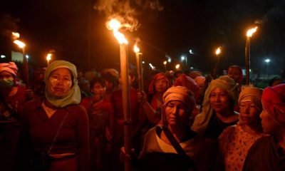 Women from the Meira Paibis group of the Meitei community in India's Manipur state protest against men accused of abusing two Kuki women after a video of the incident emerged