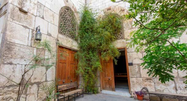 Nur al-Din Zengi's bimaristan in Damascus includes a central fountain and a garden with separate rooms for the treatment of different ailments 