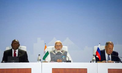 South Africa's President Cyril Ramaphosa, India's Prime Minister Narendra Modi and Russia's Foreign Minister Sergei Lavrov attend a press conference as the BRICS Summit