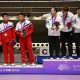 Asian Games - Hangzhou 2022 - Shooting - Fuyang Yinhu Sports Centre, Hangzhou, China - September 25, 2023 Gold medallists South Korea's Ha Kwang-chul, Jeong You-jin and Your Bin Kwak stand on the podium after the Men's Team 10m Running Target Mixed event alongside silver medallists North Korea's Kwon Kwang-il, Pak Myong-won and Songjun Yu