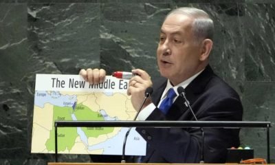 Israel's Prime Minister Benjamin Netanyahu holds his map of "The New Middle East" and a red marker pen as he addresses the 78th session of the United Nations General Assembly on September 22, 2023