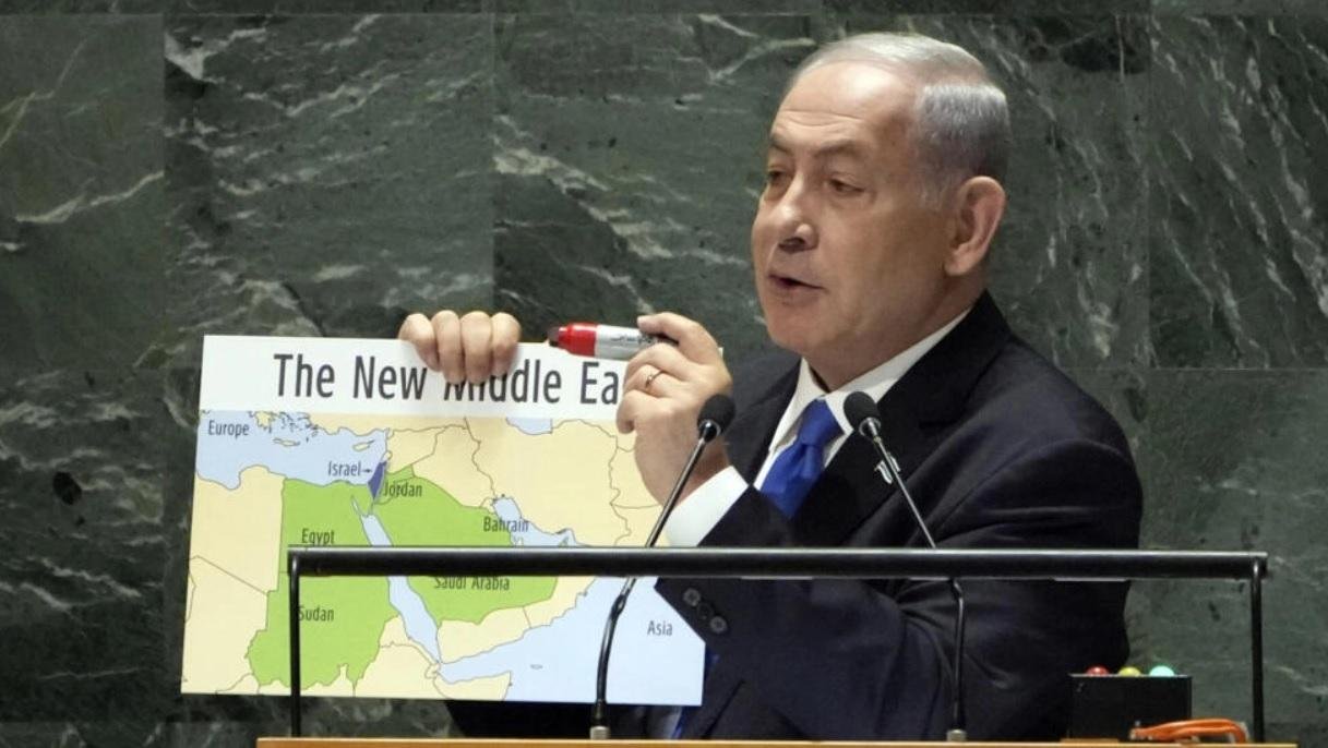 Israel's Prime Minister Benjamin Netanyahu holds his map of "The New Middle East" and a red marker pen as he addresses the 78th session of the United Nations General Assembly on September 22, 2023