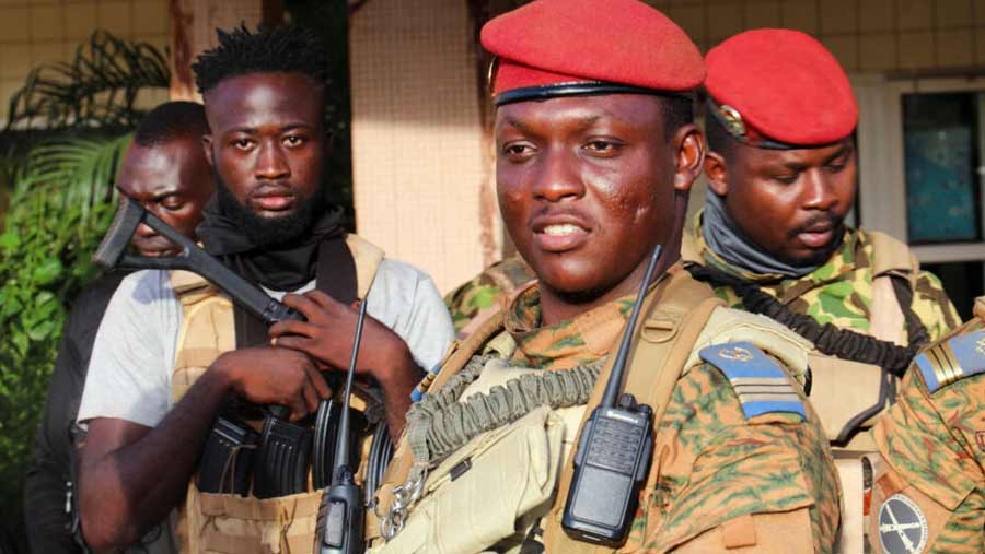 Burkina Faso's military leader Ibrahim Traoré is escorted by soldiers in Ouagadougou, Burkina Faso, October 2, 2022