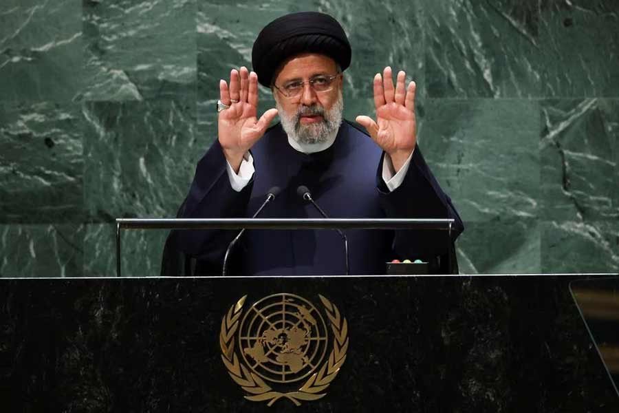 Iran's President Ebrahim Raisi gestures to the audience inside the United Nations General Assembly hall as he completes his address to the 78th Session of the U.N. General Assembly in New York City, U.S., September 19, 2023.