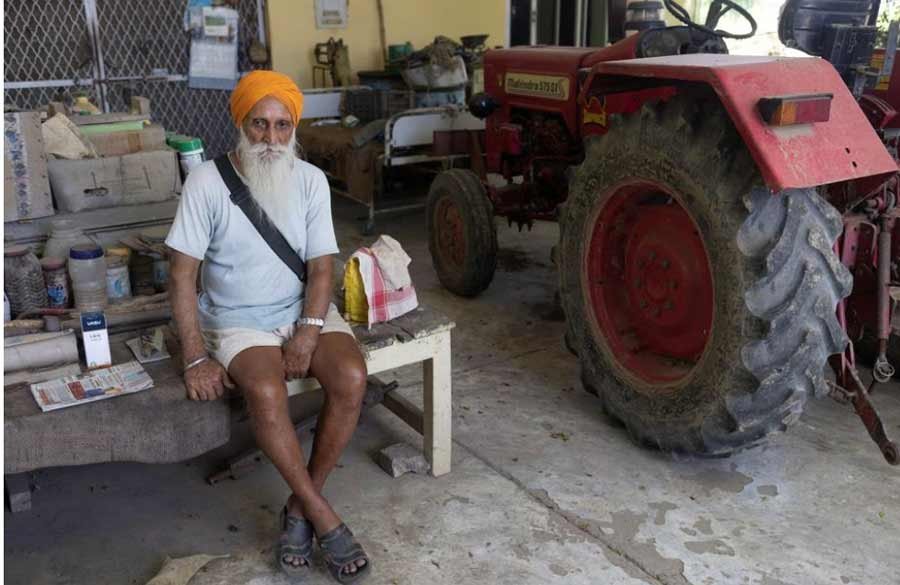 Himmat Singh Nijjar, 79, uncle of Sikh separatist leader Hardeep Singh Nijjar, sits inside his house after an interview with Reuters at village Bharsingpura, in Jalandhar district of the northern state of Punjab, India,