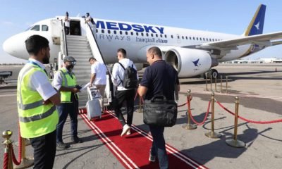 Passengers board the first Libyan-operated flight from Tripoli to Rome in nearly a decade at Mitiga airport