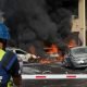 Cars burn after a rocket fired from the Gaza Strip hit a car park and a residential building in Ashkelon, southern Israel