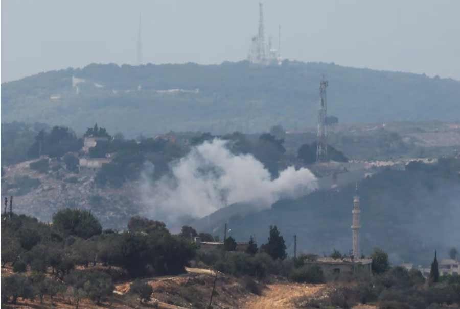 Smoke rises from Dhayra village after Israeli shelling as pictured from the Lebanese town of Marwahin, near the border with Israel, southern Lebanon, October 11, 2023