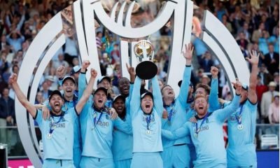 Englands-Eoin-Morgan-and-team-mates-celebrate-winning-the-world-cup-with-the-trophy.jpg