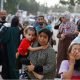 People flee their homes in Khan Younis, amid Israeli strikes in the southern Gaza Strip