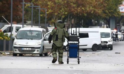 bomb disposal expert works at the scene after a bomb attack in Ankara