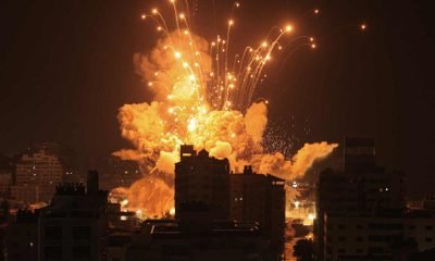 missile explodes in Gaza City during an Israeli air strike on Sunday