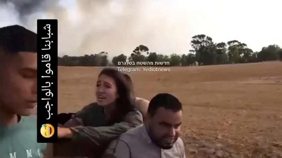 A screengrab from a social media video published on October 7, 2023 shows Noa Argamani as she is taken hostage by Palestinian militants, at an unknown location