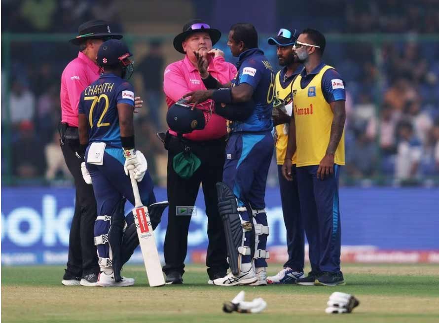 Angelo Mathews speaks to the umpires after losing his wicket due to time out