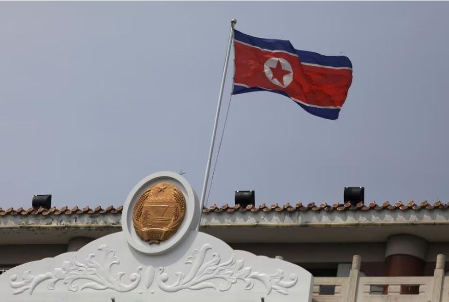 North Korean flag flutters at the North Korea consular office in Dandong, Liaoning province, China