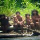 Members of the Mashco-Piro tribe observe a group of travelers from across the Alto Madre de Dios river in the Manu National Park in the Amazon basin of southeastern Peru, as photographed through a bird scope, October 21, 2011. Peru prohibits contact with the Mashco Piro and another dozen "uncontacted" tribes, mainly because their immune systems carry little resistance to common illnesses.